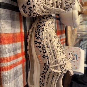 Nike Athletic Shoes with Leopard Print and Orange Swoosh